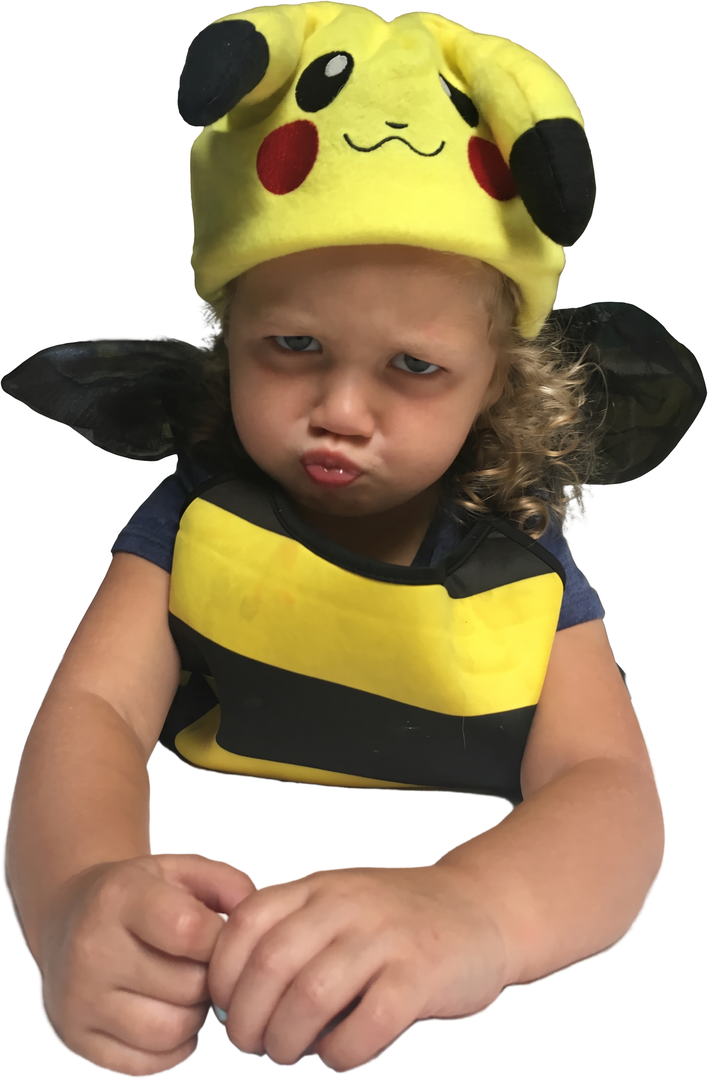 A cranky, overtired toddler in a Pikachu hat and bee costume